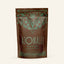 A 1.32oz packet of Azomalli Peppermint Brew Cacao tea, dark brown with teal text and animal imagery, on white background.